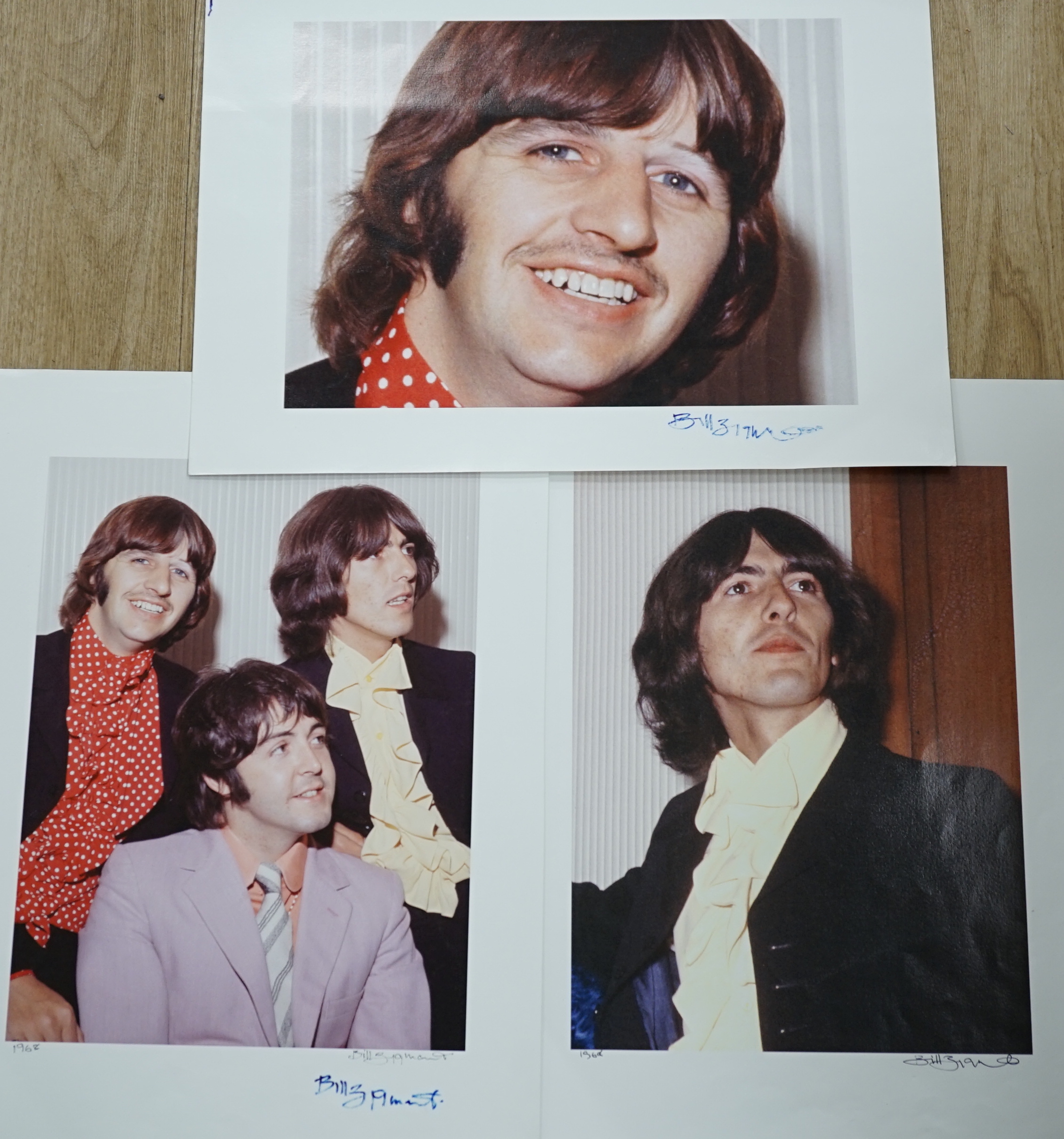 Three photographs of the Beatles by Bill Zygmant; Ringo Starr, George Harrison and a group comprising Paul, John and Ringo, all signed by Zygmant and two dated 1968, all 54 x 40cm